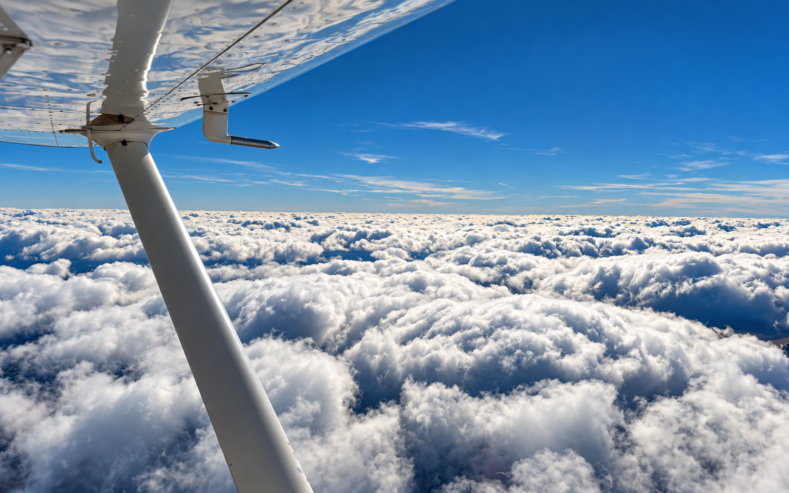 Aerial view above the clouds from a Canadian Pilot Academy training flight